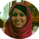 Photo of the head of Taslima Ivy smiling into the camera
